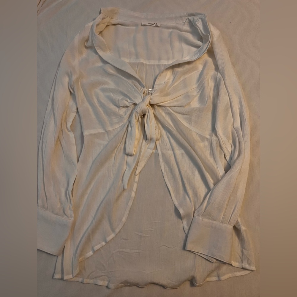 White long sleeve top